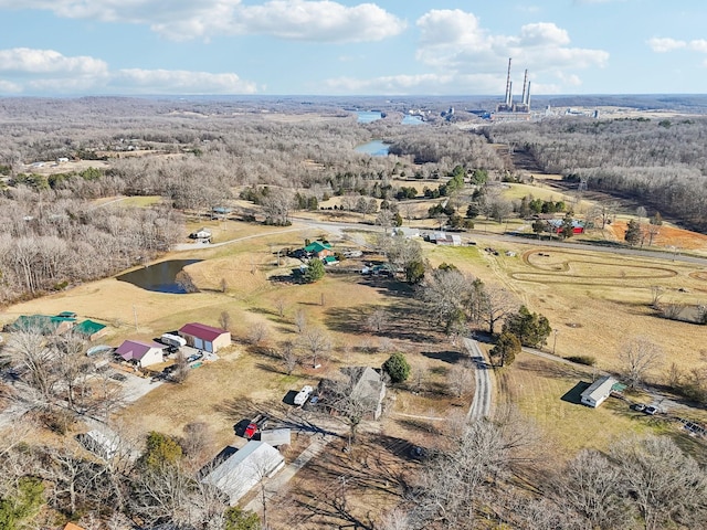 birds eye view of property with a water view and a rural view