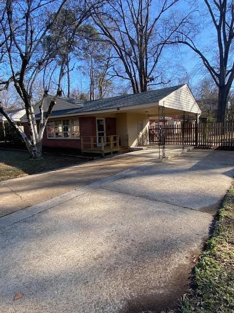 view of front of house featuring a carport