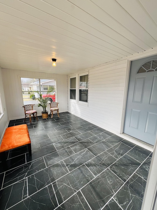 view of unfurnished sunroom