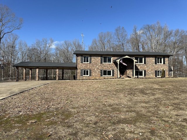 view of front of house featuring a carport