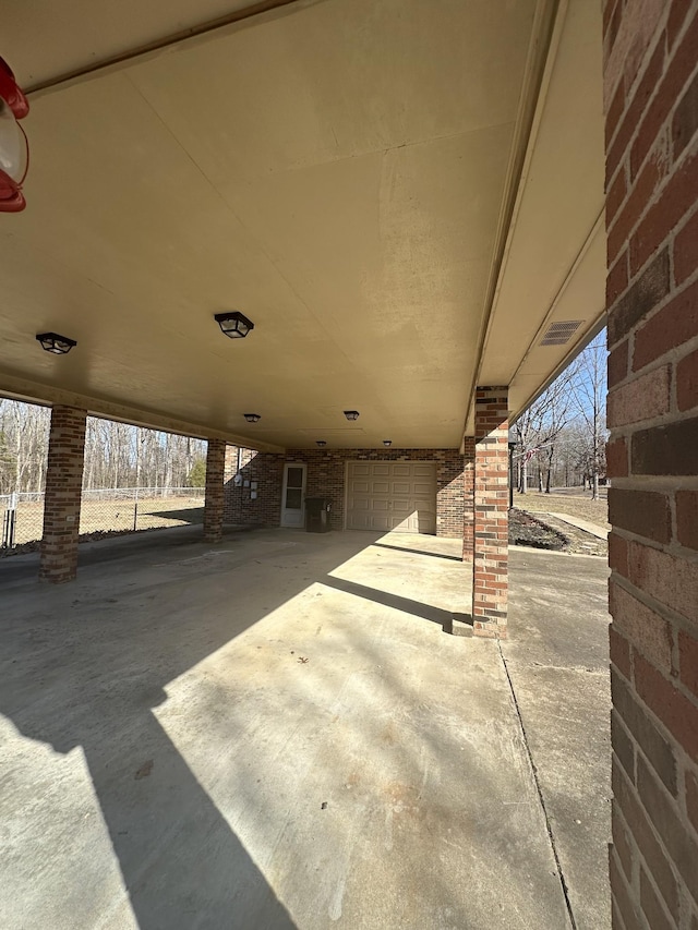 view of patio / terrace with a garage