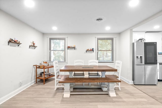 dining space featuring light hardwood / wood-style flooring