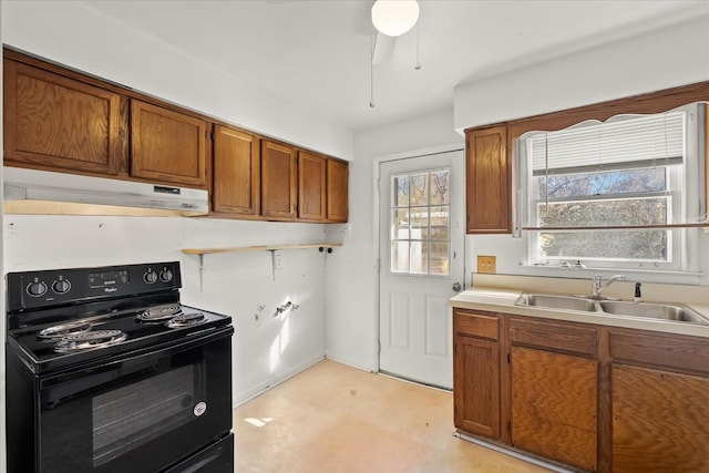 kitchen with ceiling fan, black range with electric stovetop, and sink