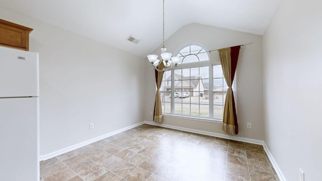 unfurnished dining area featuring vaulted ceiling and a notable chandelier