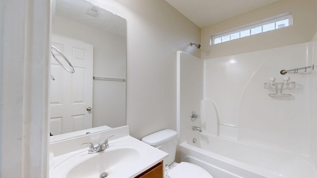 full bathroom featuring vanity, toilet, and washtub / shower combination