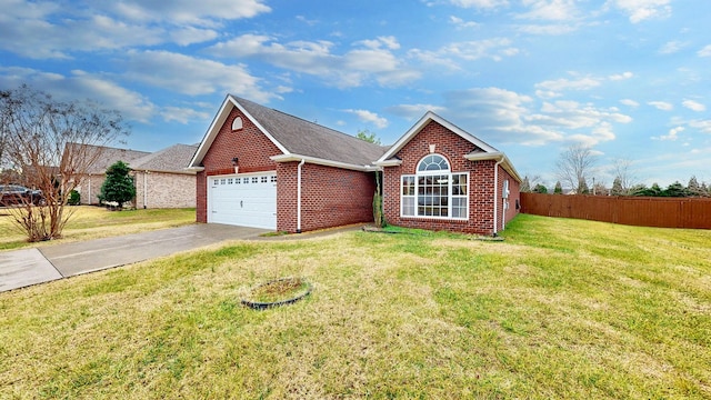 view of front of house featuring a garage and a front yard