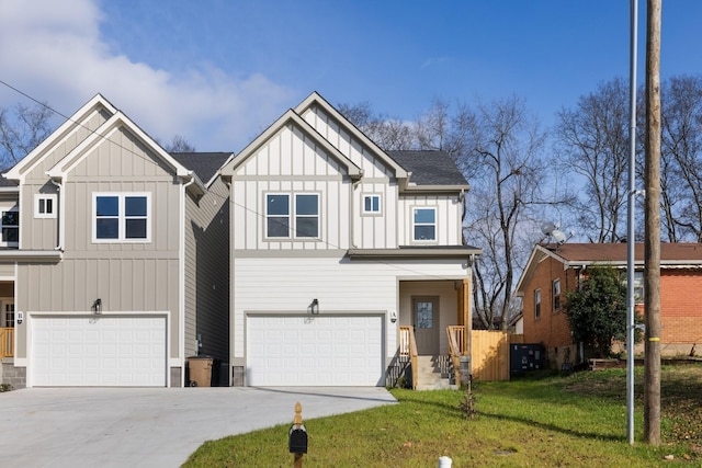 view of front of home featuring a garage and a front yard