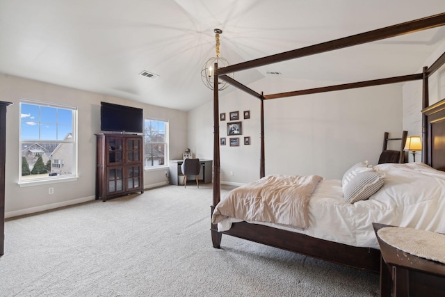 carpeted bedroom with lofted ceiling with beams and a notable chandelier