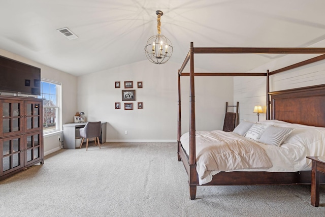 bedroom featuring vaulted ceiling, carpet flooring, and a notable chandelier