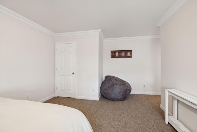 bedroom featuring ornamental molding and carpet