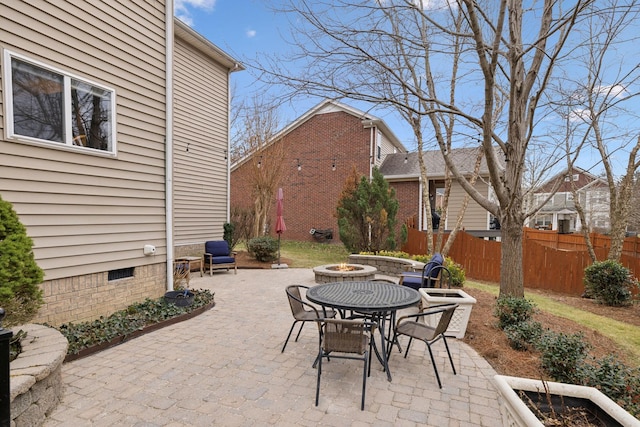 view of patio featuring a fire pit