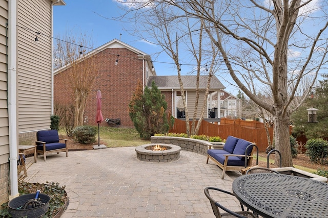 view of patio / terrace featuring a fire pit