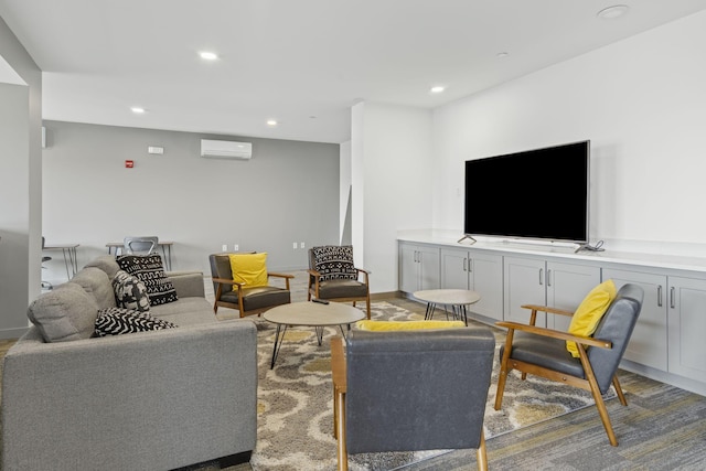 living room featuring an AC wall unit