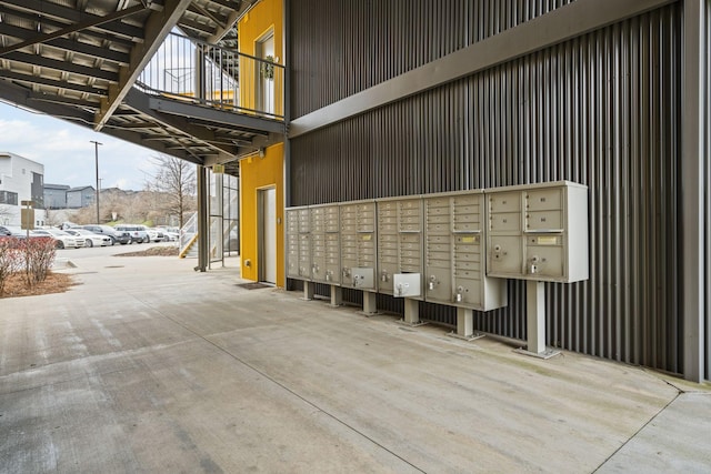 view of home's community with a mail area