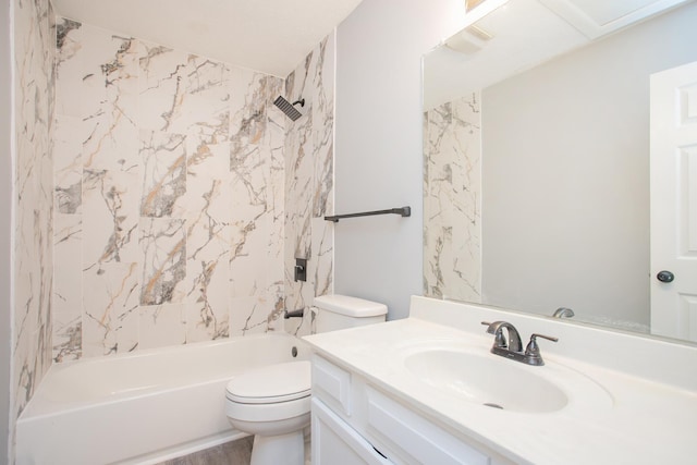 full bathroom featuring vanity, toilet, and tiled shower / bath combo