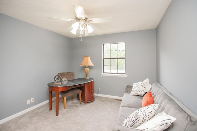 office featuring light carpet and ceiling fan