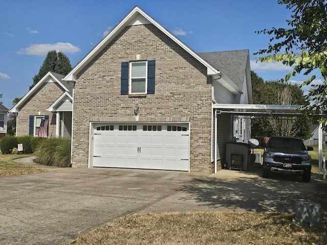 view of side of home with a garage