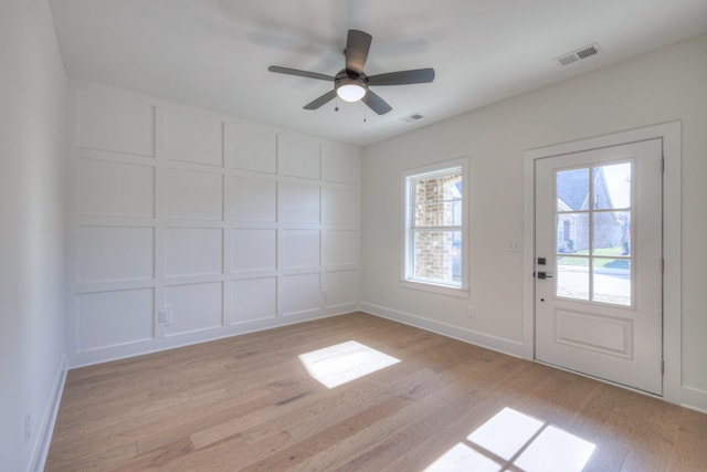 interior space featuring ceiling fan and light wood-type flooring