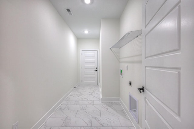 laundry area featuring hookup for an electric dryer and hookup for a washing machine