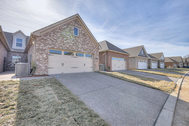 view of front of property featuring a front yard and central air condition unit