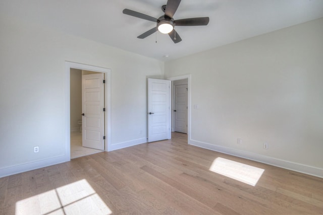 unfurnished bedroom with light hardwood / wood-style floors and ceiling fan