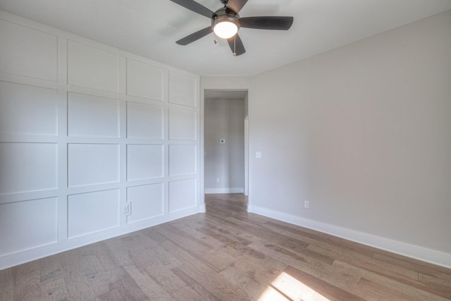 interior space with ceiling fan and light hardwood / wood-style floors