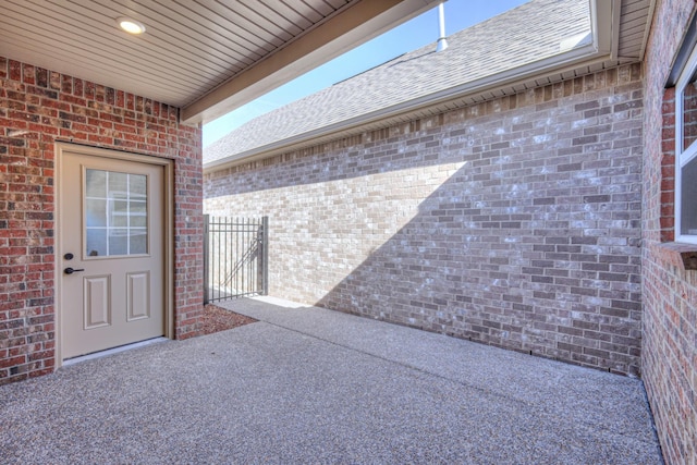 entrance to property with a patio