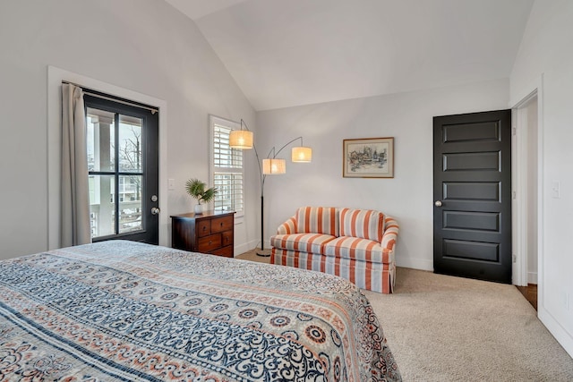 bedroom featuring vaulted ceiling and carpet flooring