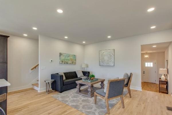 living room with light hardwood / wood-style floors