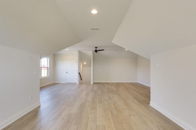 bonus room featuring ceiling fan and light wood-type flooring