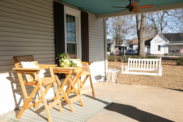 view of patio featuring ceiling fan