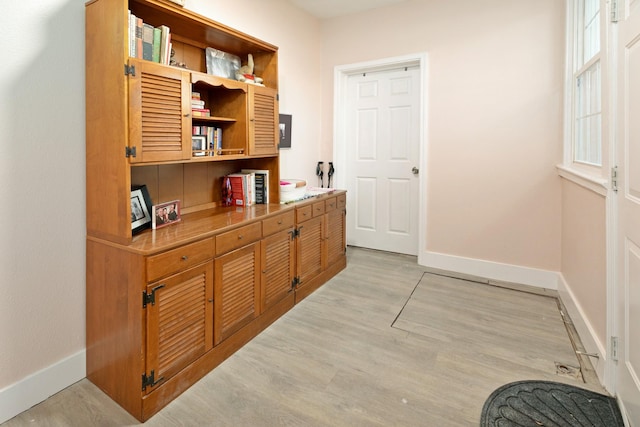 hall featuring light wood-type flooring