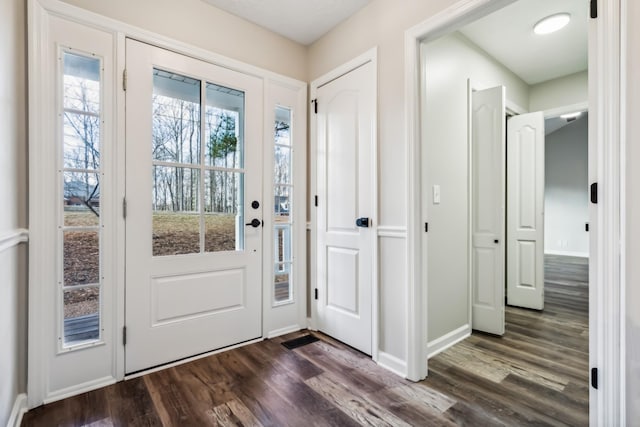 foyer featuring dark hardwood / wood-style floors