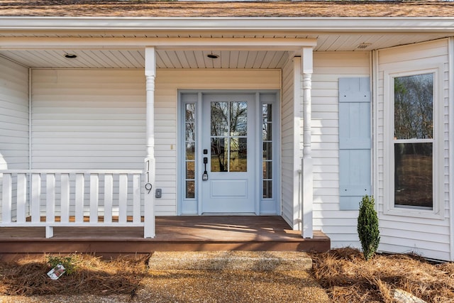 property entrance with covered porch