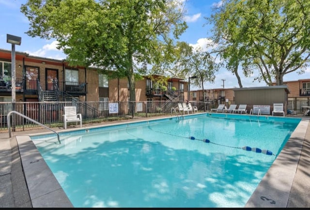 pool featuring fence