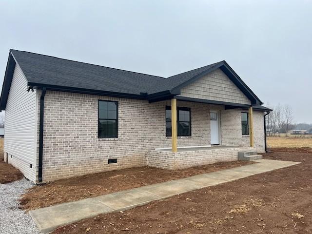 view of front of home featuring covered porch