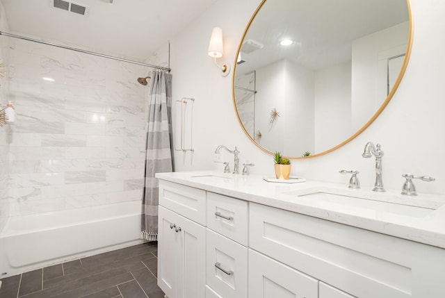 bathroom featuring vanity and shower / tub combo