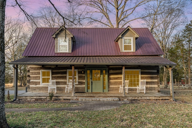 view of front of property featuring covered porch