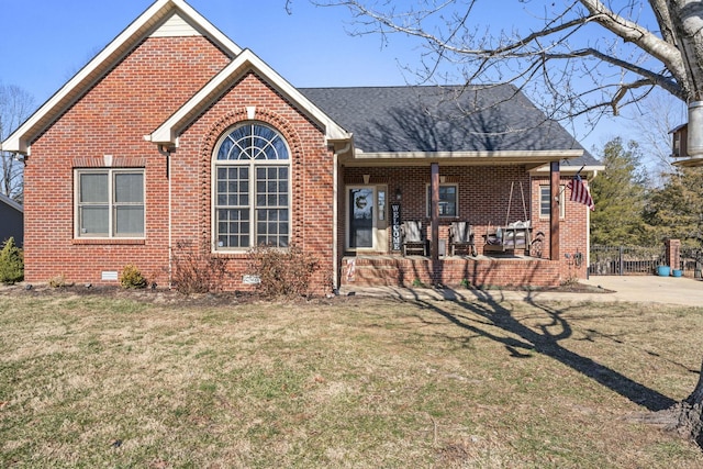 view of front of house featuring a porch and a front yard