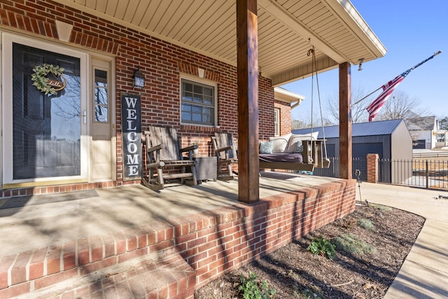 view of patio featuring covered porch