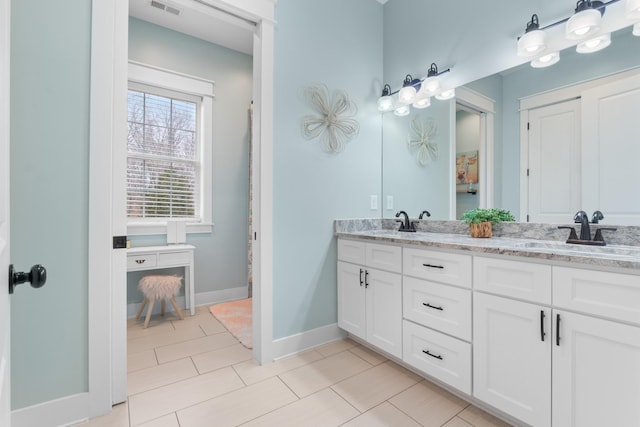 bathroom featuring vanity