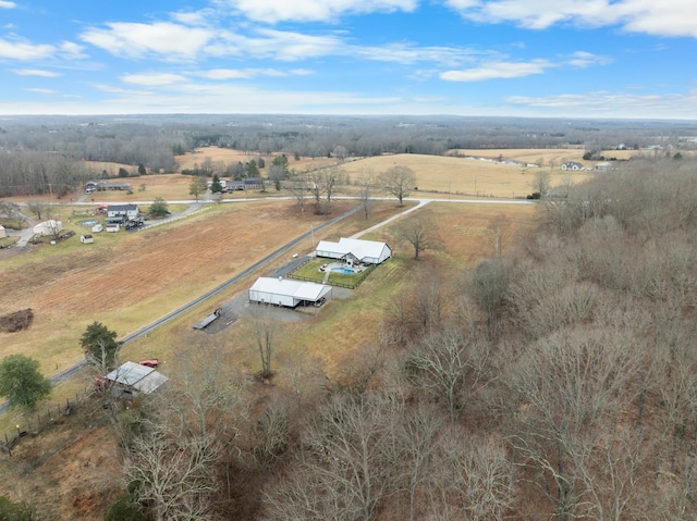 birds eye view of property featuring a rural view