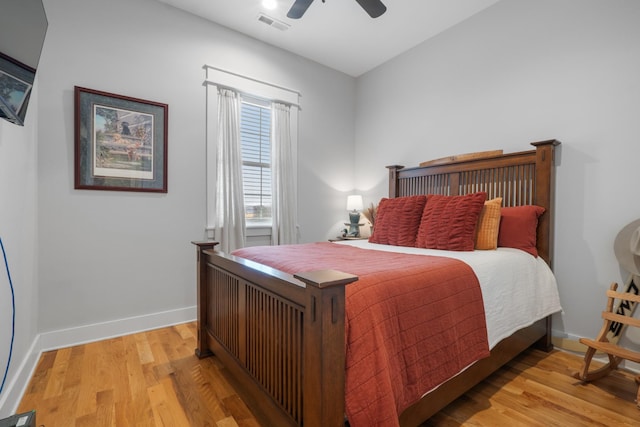 bedroom with ceiling fan and light wood-type flooring