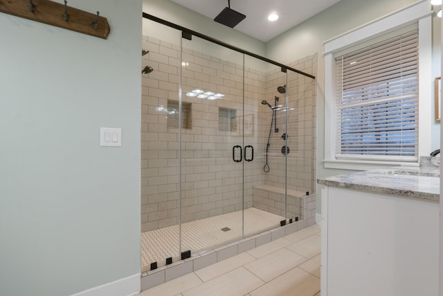 bathroom featuring an enclosed shower