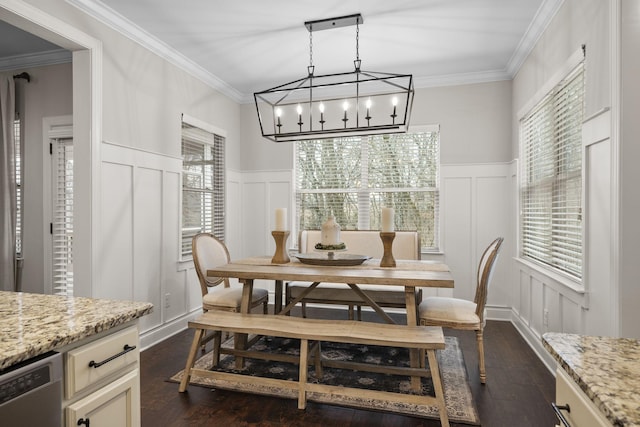 dining area featuring crown molding and dark hardwood / wood-style floors