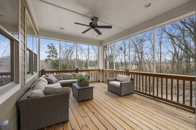 sunroom / solarium with ceiling fan