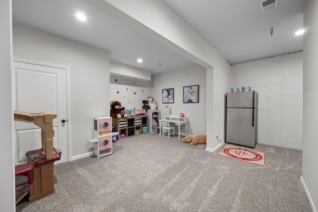 rec room featuring carpet flooring