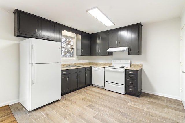 kitchen featuring sink and white appliances