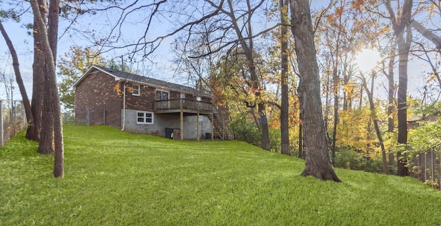 view of yard featuring a wooden deck