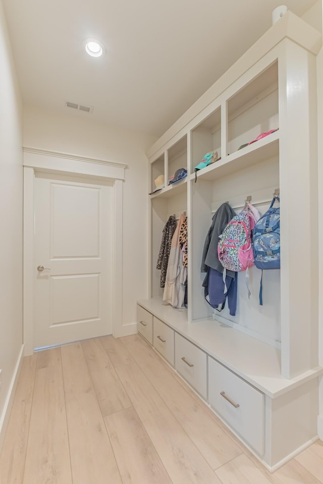 mudroom with light wood-type flooring